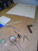 drawing out the frames on a sheet of plywood